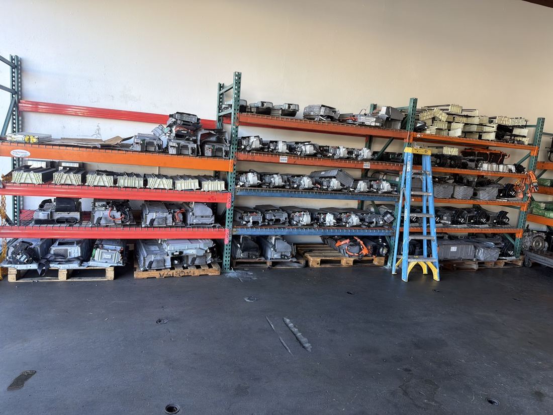 Shelves of hybrid battery packs in stock